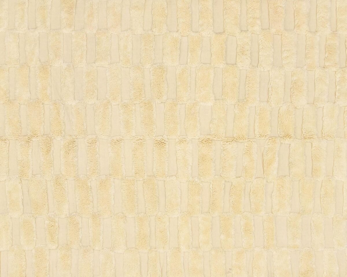 A close-up view of a textured beige fabric showcasing a sophisticated grid-like pattern, perfect for adding an element of elegance to any space.