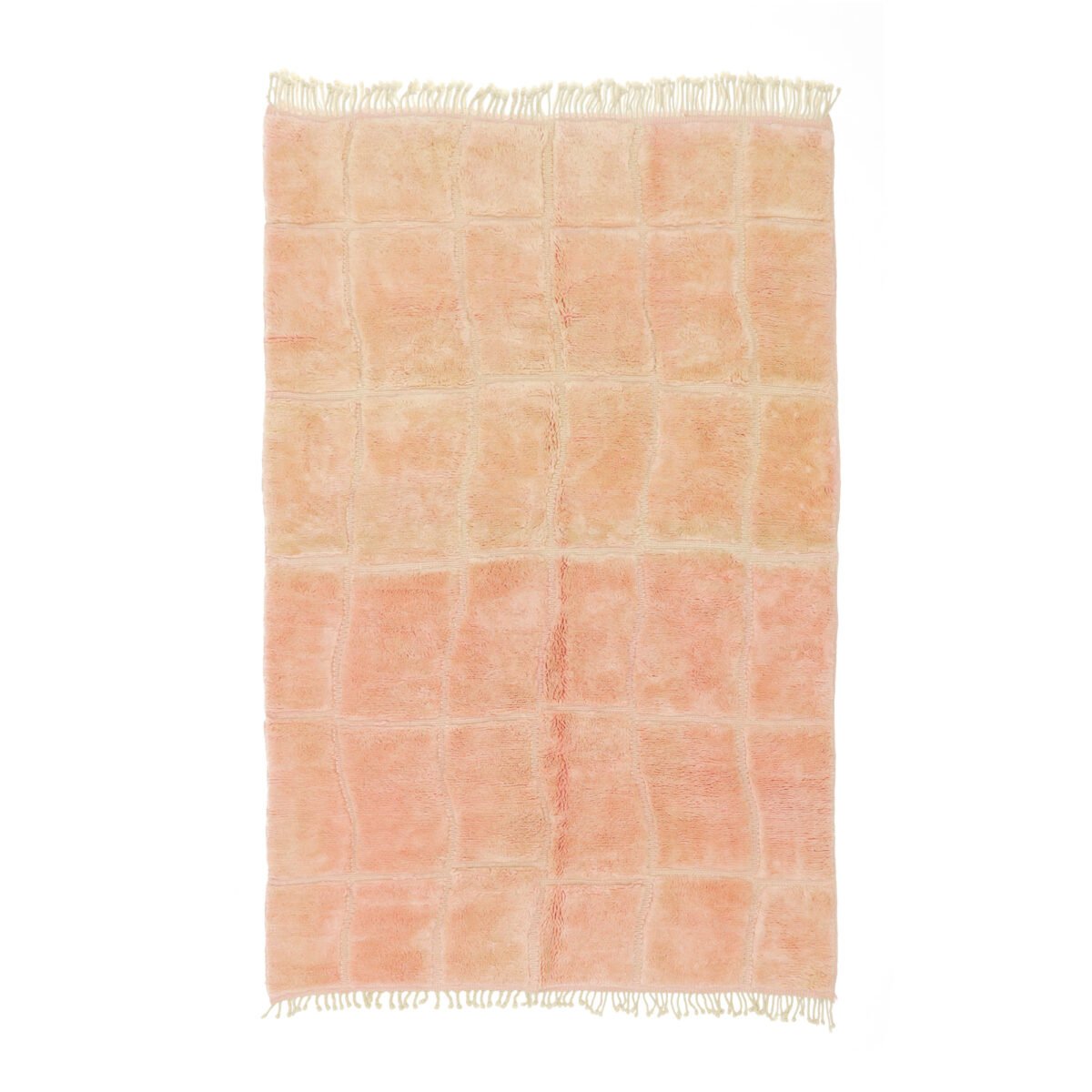 Moroccan rug featuring a soft peach hue with a subtle grid pattern, providing a gentle and soothing visual texture.