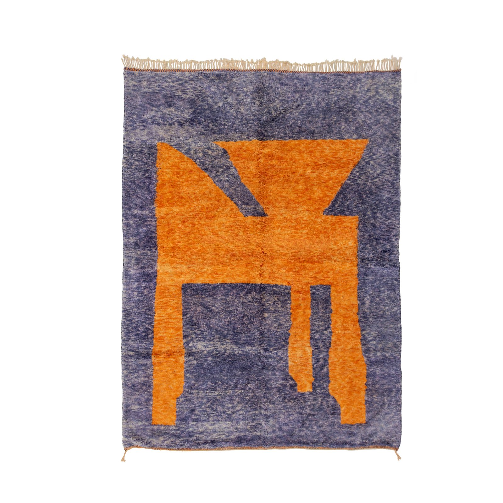 Moroccan rug featuring a large geometric design in orange set against a purple background.