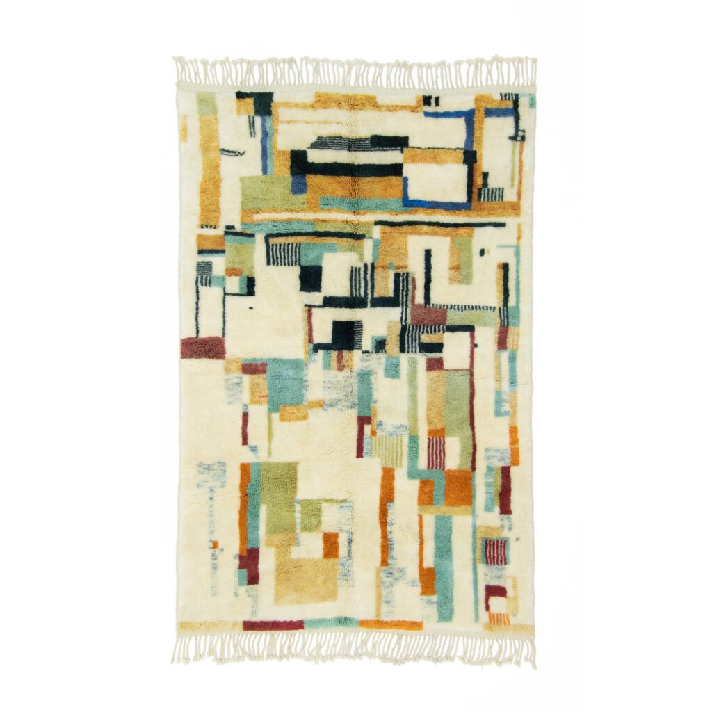 Abstract multicolored geometric pattern rug with fringe on top and bottom edges, featuring rectangles and lines in shades of blue, orange, yellow, and green on a cream background.