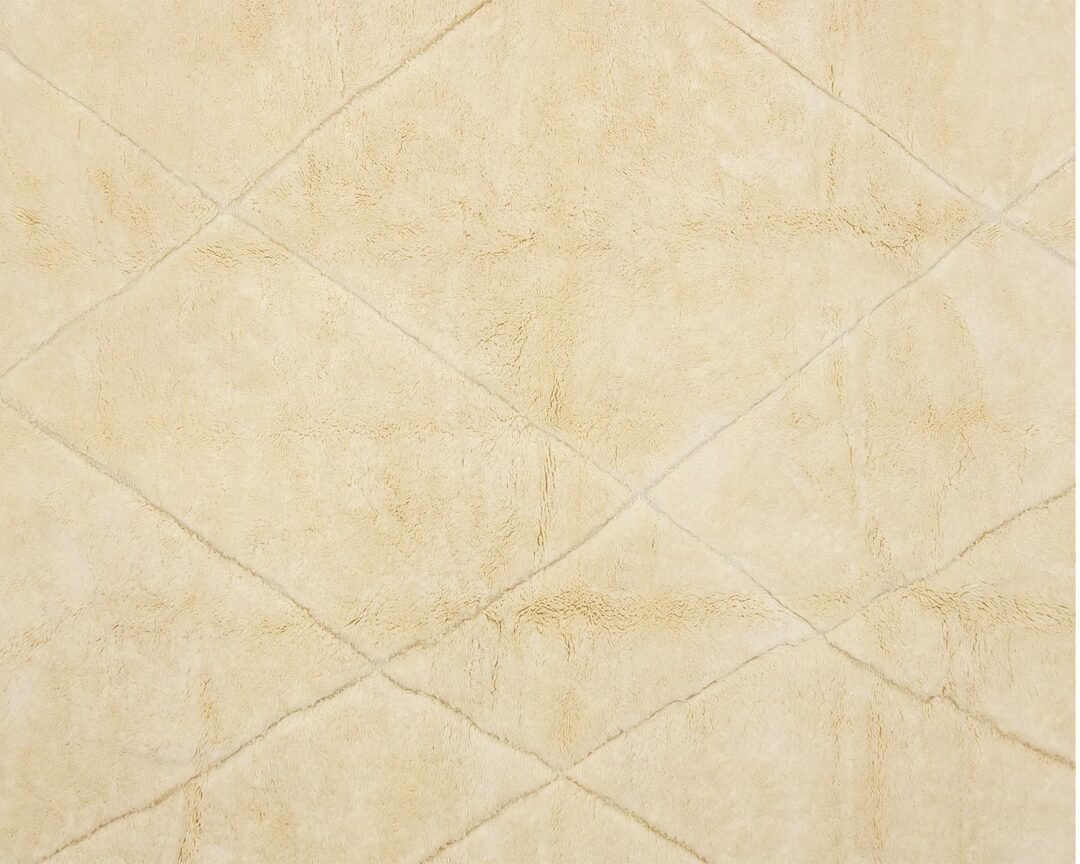 Experience the elegance of this beige, plush, hand-knotted rug featuring a subtle diamond pattern, adding a touch of sophistication to any space.