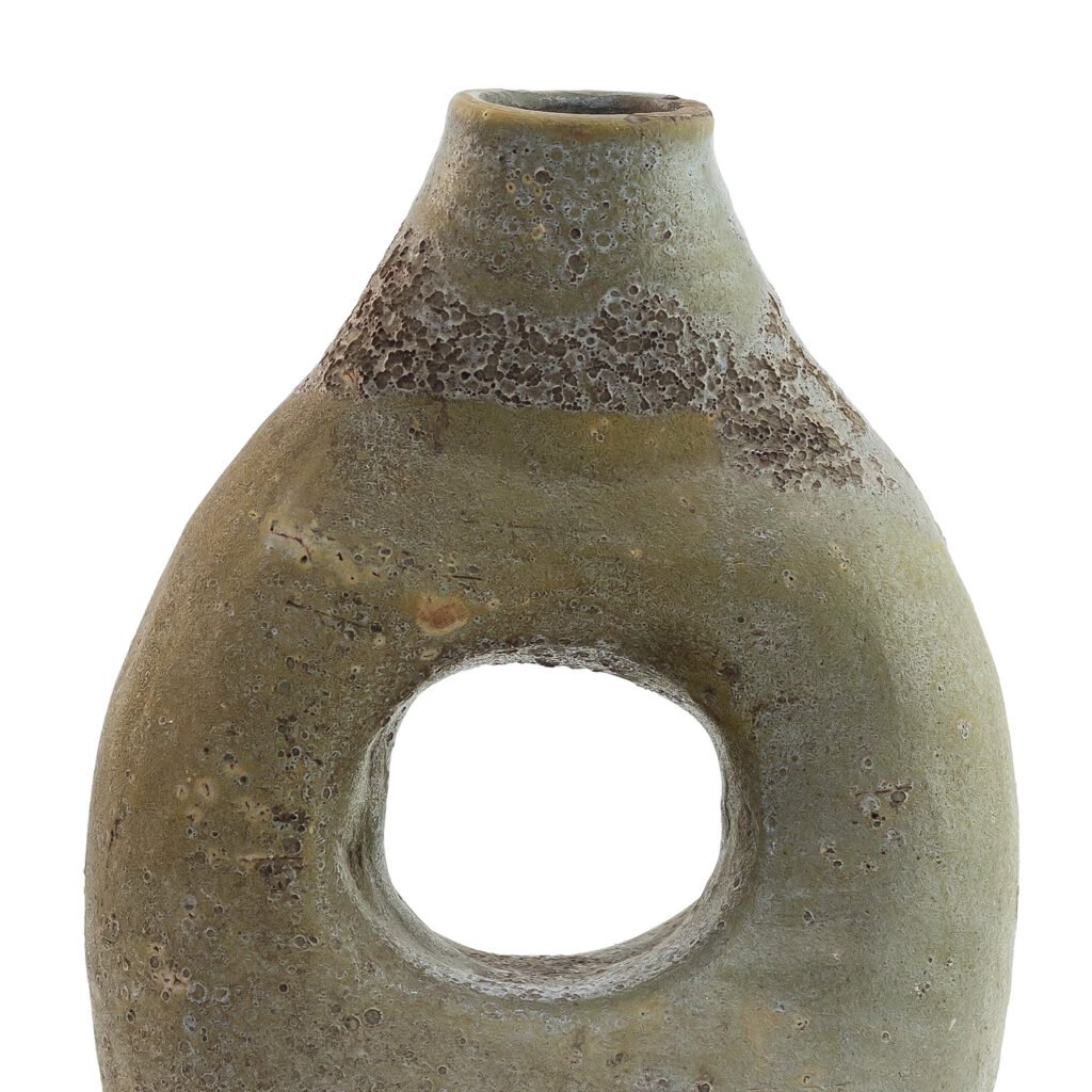 A rugged, oval-shaped ceramic vase inspired by Tamegroute pottery, features a textured surface with a circular hole in the center and a narrow opening at the top.
