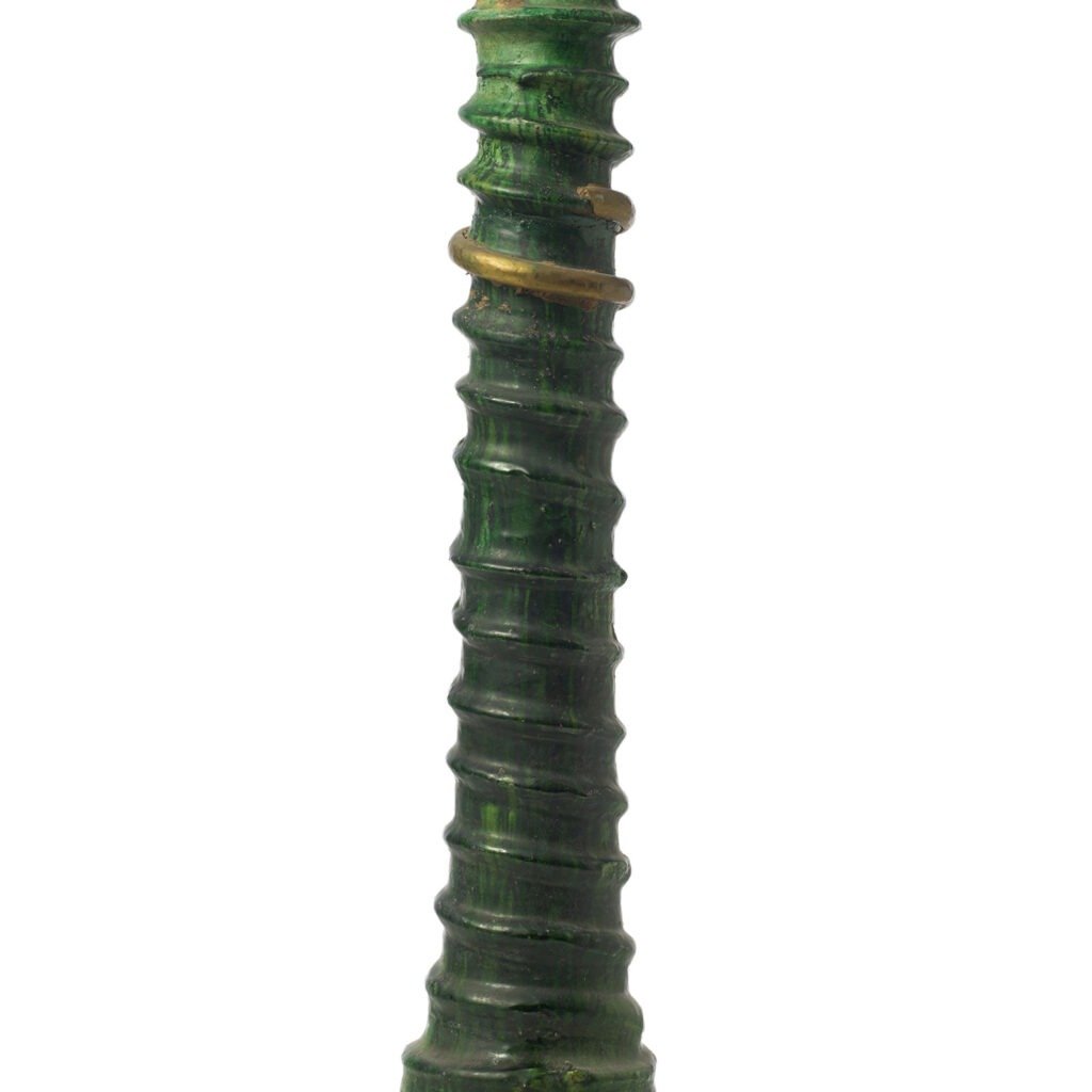 A tall, green, spiraled vase crafted in the style of Tamegroute pottery features a glossy finish and a distinct ring around the top.