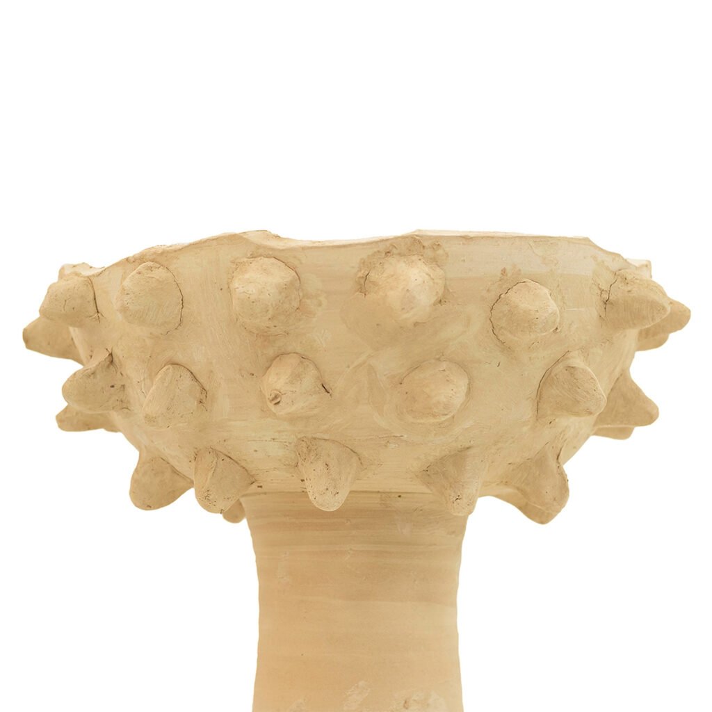 Tamegroute pottery-inspired clay goblet with a wide, textured rim adorned with multiple protruding conical shapes, elegantly resting on a narrow base.