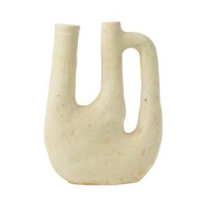 An unglazed, sculptural, pale beige ceramic vase features three elongated spouts and an integrated handle on one side, reminiscent of Tamegroute potterys distinctive style.