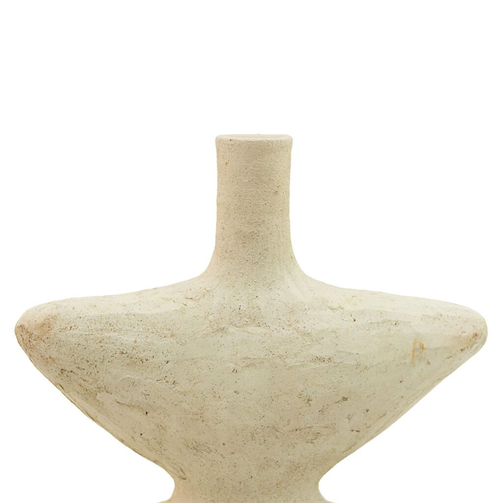 This beige ceramic vase, reminiscent of Tamegroute pottery, features a narrow neck and a wide, shallow body. Its rustic texture and unglazed finish evoke a time-honored charm.