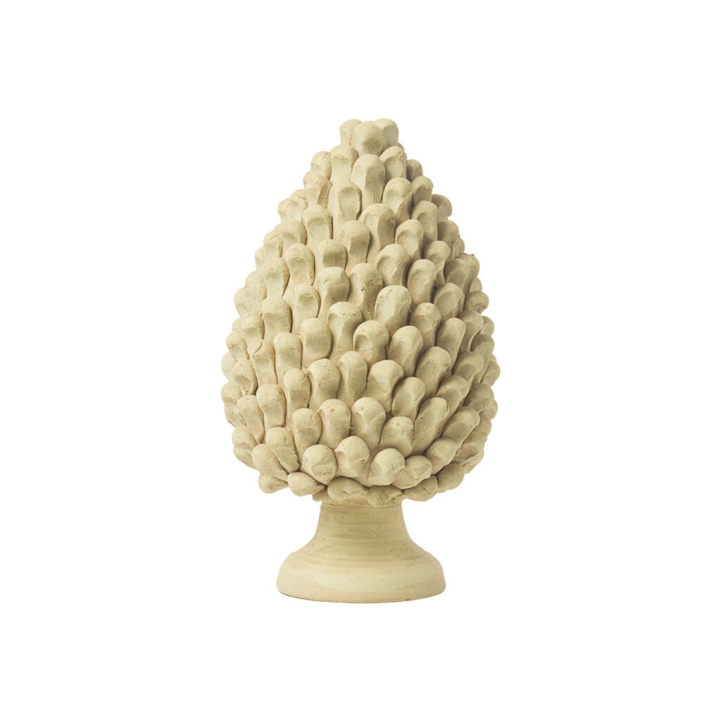 A cream-colored ceramic pine cone ornament with a textured surface, reminiscent of unglazed Tamegroute pottery, standing proudly on a small round base.