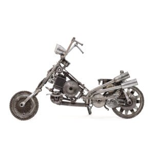 A handmade metal sculpture of a motorcycle, crafted from various mechanical parts like gears, pipes, and chains, showcases intricate craftsmanship and serves as an exceptional piece of home decor.