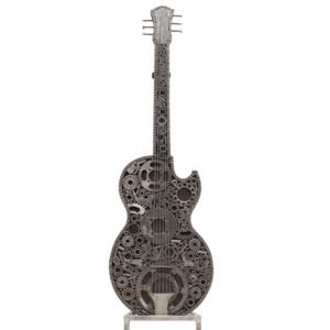 This handmade guitar sculpture, crafted from various metal gears and parts, boasts an intricate design. Perfect for home decor, it stands gracefully on a simple rectangular base.