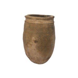A large, weathered clay pot reminiscent of vintage Berber jars with a textured surface and a simple, rounded shape. The rim is slightly thickened and features a subtle decorative pattern.