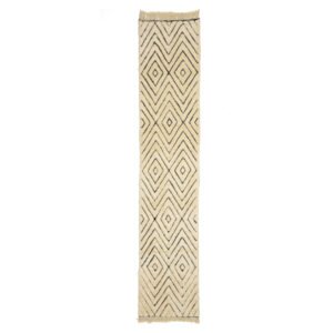 A chic, narrow rug featuring a cream background and an eye-catching geometric diamond pattern in black, perfect for adding a touch of sophistication to any room.