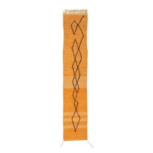 A vibrant orange runner rug adorned with a vertical geometric pattern of diamond shapes in the center.