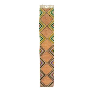 A vibrant woven runner with geometric diamond patterns in orange, green, yellow, and pink, accented by fringed edges.