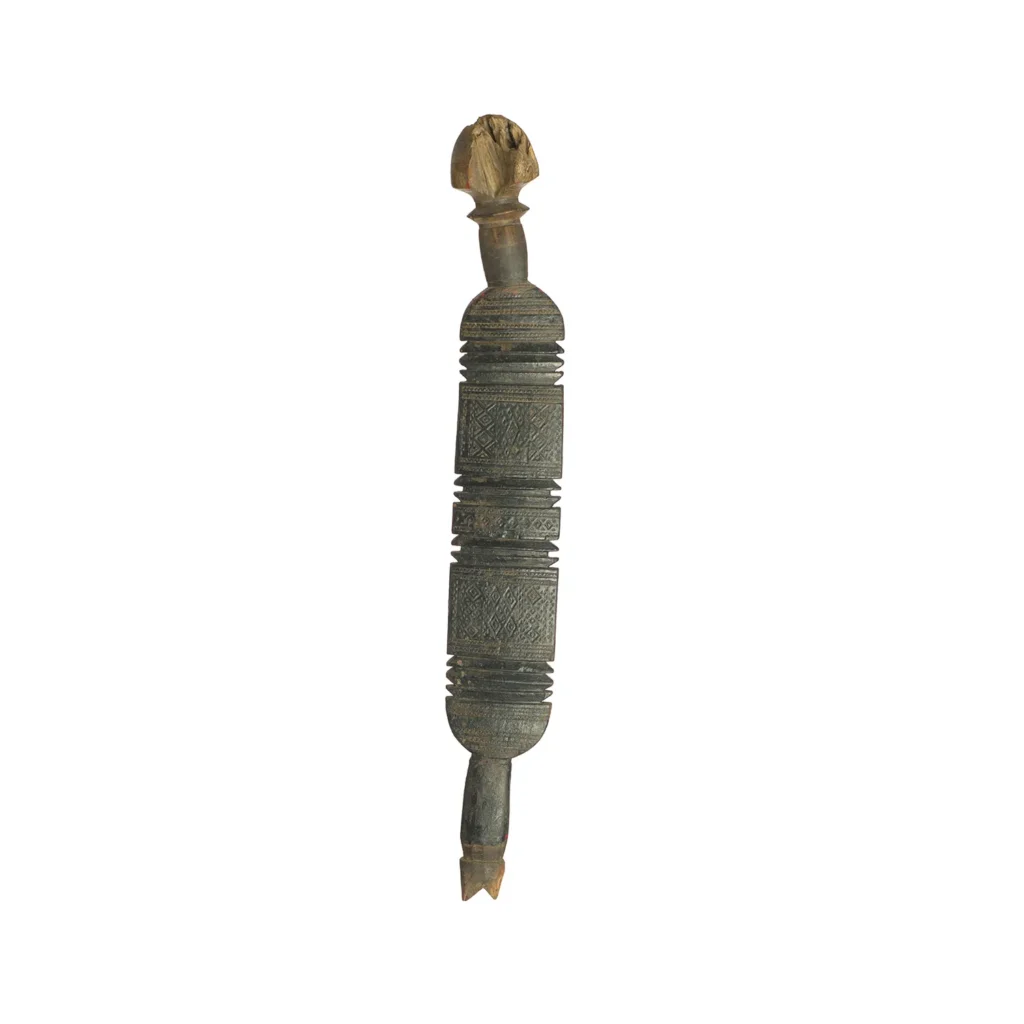 This hand-carved, vintage wooden wand showcases intricate geometric patterns and decorative ends, reminiscent of an elegant tent peg.