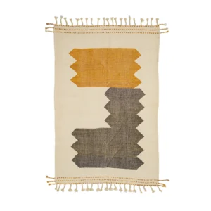 Rectangular woven rug with fringe edges, showcasing geometric patterns in mustard yellow and dark gray on a beige background, adds a touch of elegance to any rooms decor.