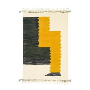 This handwoven rug showcases a geometric design with a prominent yellow zigzag against deep green and cream sections, complemented by small tassels along the edges.