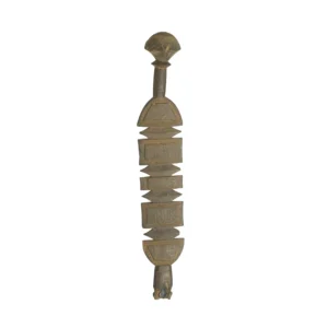 A hand-carved vintage wooden object with a spherical top, geometric orbs, and vertically arranged bands features detailed patterns and a small animal-like figure at the base, reminiscent of an elaborate tent peg from bygone eras.