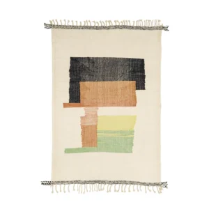 A rectangular woven rug with fringe edges showcases abstract colored blocks in black, brown, orange, and green on a beige background, adding a touch of artistic flair to any room.