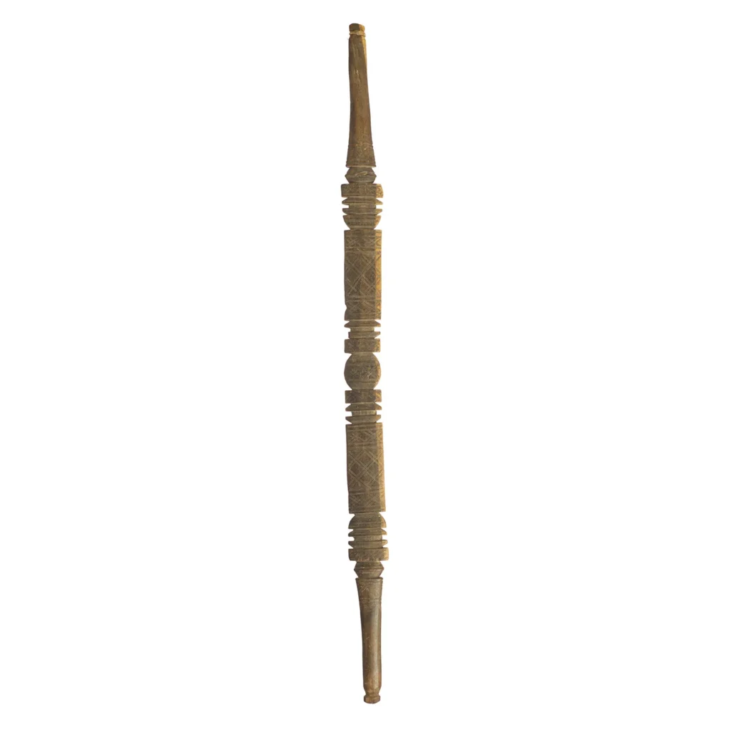 Hand-carved vintage wooden staff with intricate patterns and a symmetrical design, featuring two handles and a central decorative section reminiscent of an ornate tent peg.