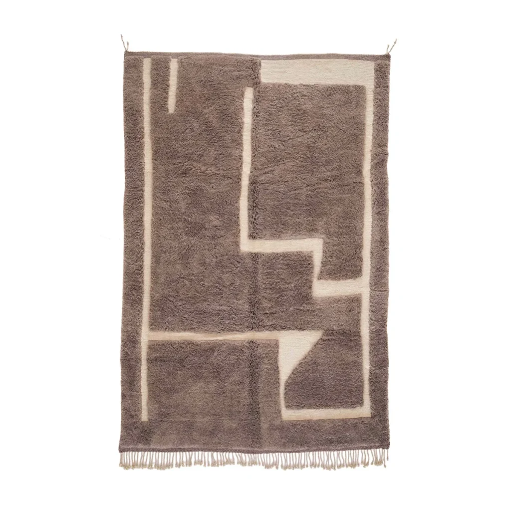 Experience the elegance of a hand-knotted Moroccan rug, featuring a rectangular design in beige and brown. This luxury piece boasts abstract geometric patterns and short fringe on its bottom edge, adding a touch of sophistication to any space.