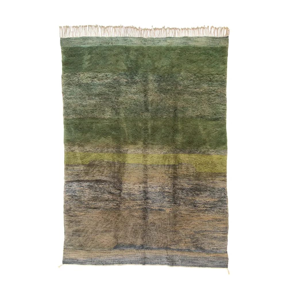 A vibrant rectangular rug showcases a harmonious blend of green, brown, and blue hues. Delicately woven, it features charming tassels along the top edge.