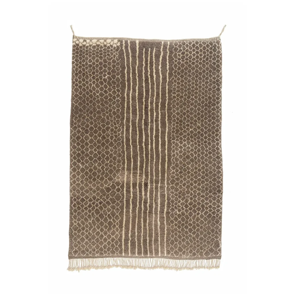 An artisanal rectangular brown rug, showcasing a geometric pattern and fringe edges. The design features a central striped section flanked by diamond shapes, reminiscent of authentic Moroccan rugs.