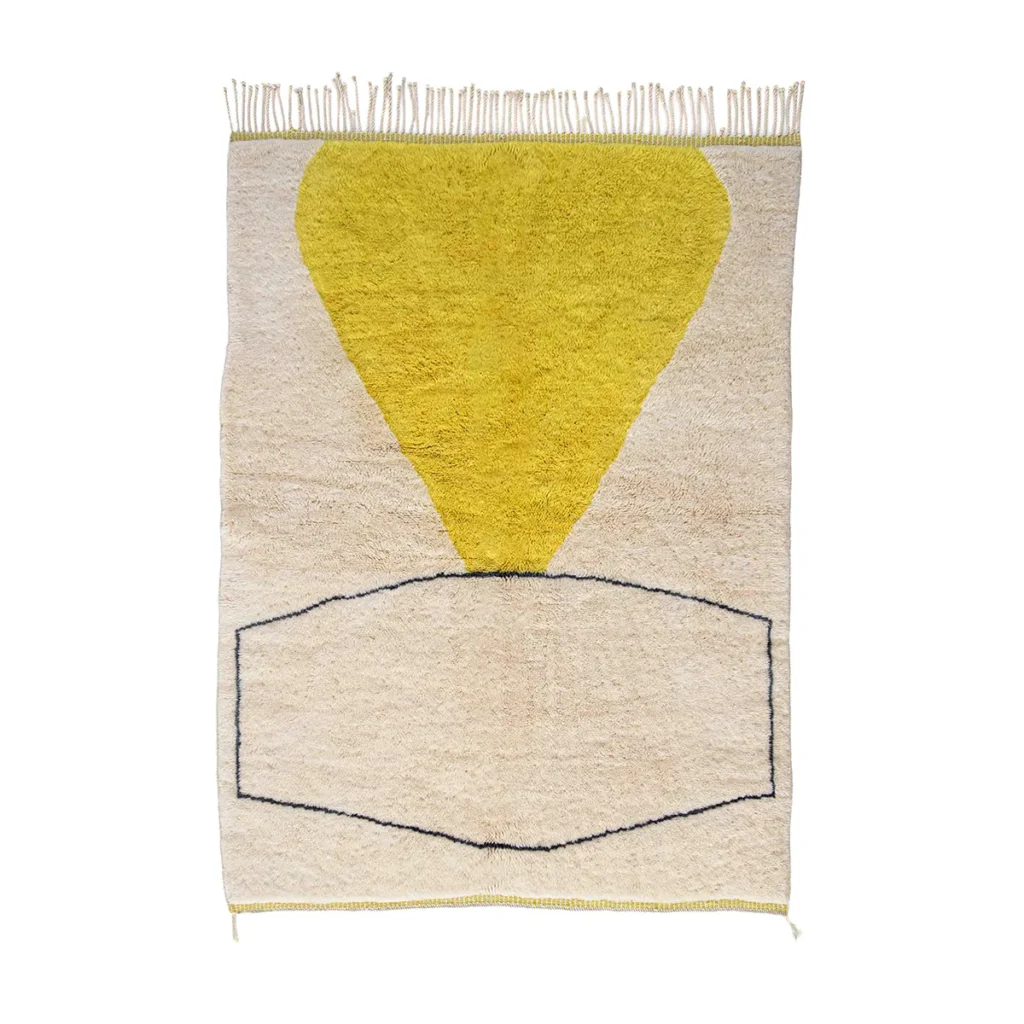Experience the elegance of luxury with this hand-knotted woven rug. It features a large yellow teardrop shape above a trapezoid outline on a beige background, complemented by fringe along the top edge.