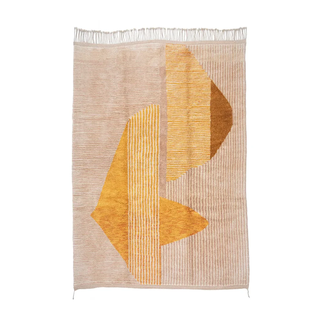 This luxurious Moroccan rug is a rectangular beige masterpiece, adorned with mustard yellow and brown geometric patterns. It showcases elegant vertical stripes and a fringe on the top edge, offering an exquisite touch to any space. Perfect for adding a blend of tradition and elegance to your decor.