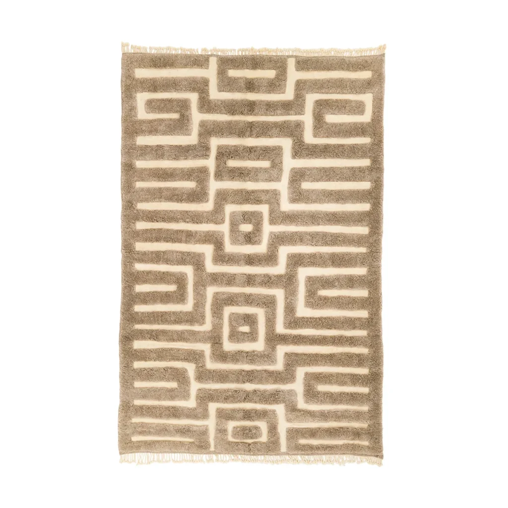 This hand-knotted Moroccan rug features a rectangular design in beige and brown, showcasing a geometric labyrinth pattern with elegant fringe edges.