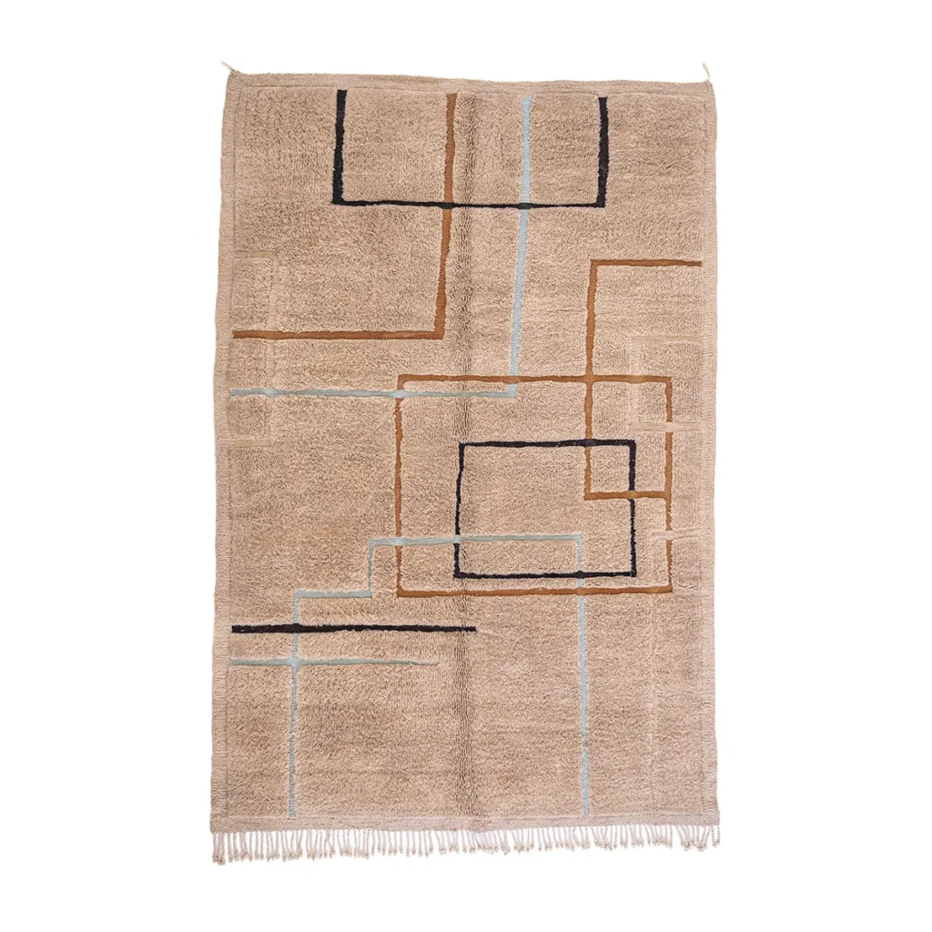 This luxurious rug in beige showcases hand-knotted geometric lines in black, brown, and light blue, with an elegant pattern of intersecting squares and rectangles.
