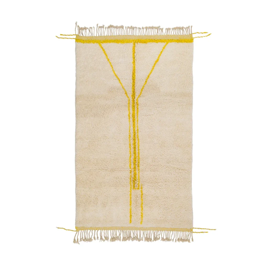 This beige rectangular rug features a luxurious yellow Y-shape pattern and elegant fringe detailing on all sides, exemplifying the artistry of hand-knotted rugs.
