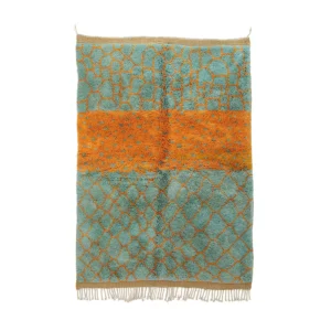Authentic Moroccan rug with a vibrant blue and orange geometric pattern of interconnected shapes. The fringed edges enhance its artisanal charm, showcasing the intricate hand-knotted craftsmanship typical of genuine pieces.
