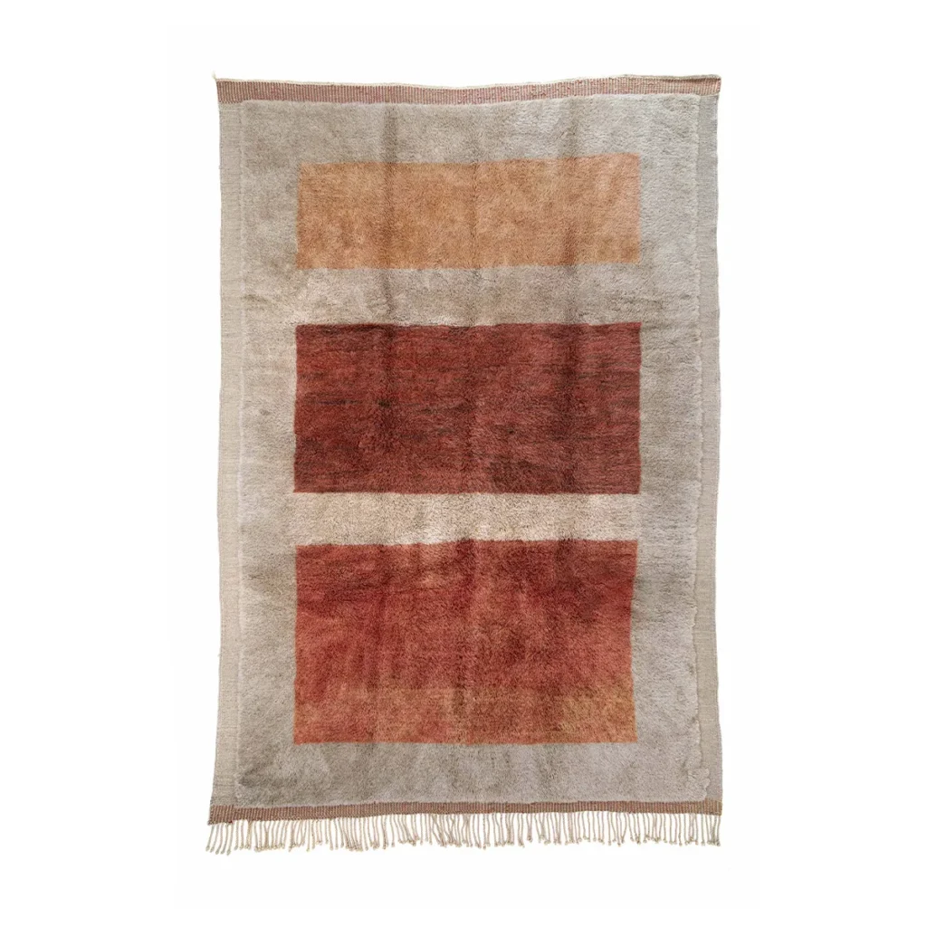 This hand-knotted, geometric-patterned rug features three horizontal rectangular stripes in soothing beige, light brown, and rich reddish-brown tones. Crafted with care, the artisanal rug is completed with fringe on one shorter edge, adding a touch of elegance to any room.