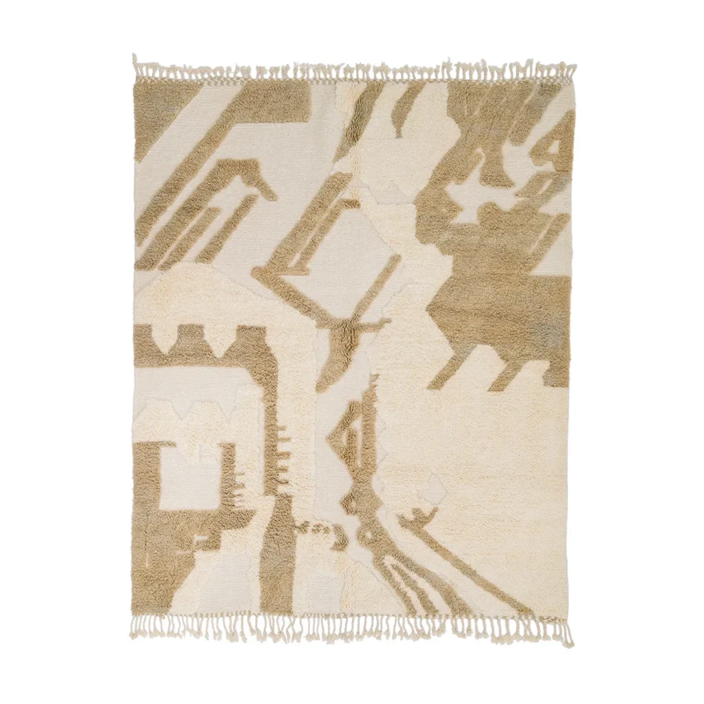 Luxurious Moroccan rug in beige and cream tones, featuring an abstract pattern with hand-knotted fringes on the shorter edges.