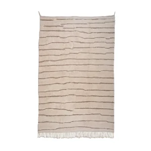 Discover the elegance of a beige luxury rug featuring irregular horizontal brown lines and adorned with fringe tassels. Perfect for adding a touch of handmade home decor charm to any space, this piece seamlessly blends style and comfort in your living area.