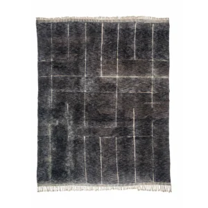 This artisanal rug features a dark woven design with a geometric pattern of intersecting rectangles and light fringed edges on a white background. Hand-knotted for added authenticity, it brings an essence of authentic Moroccan style to your space.