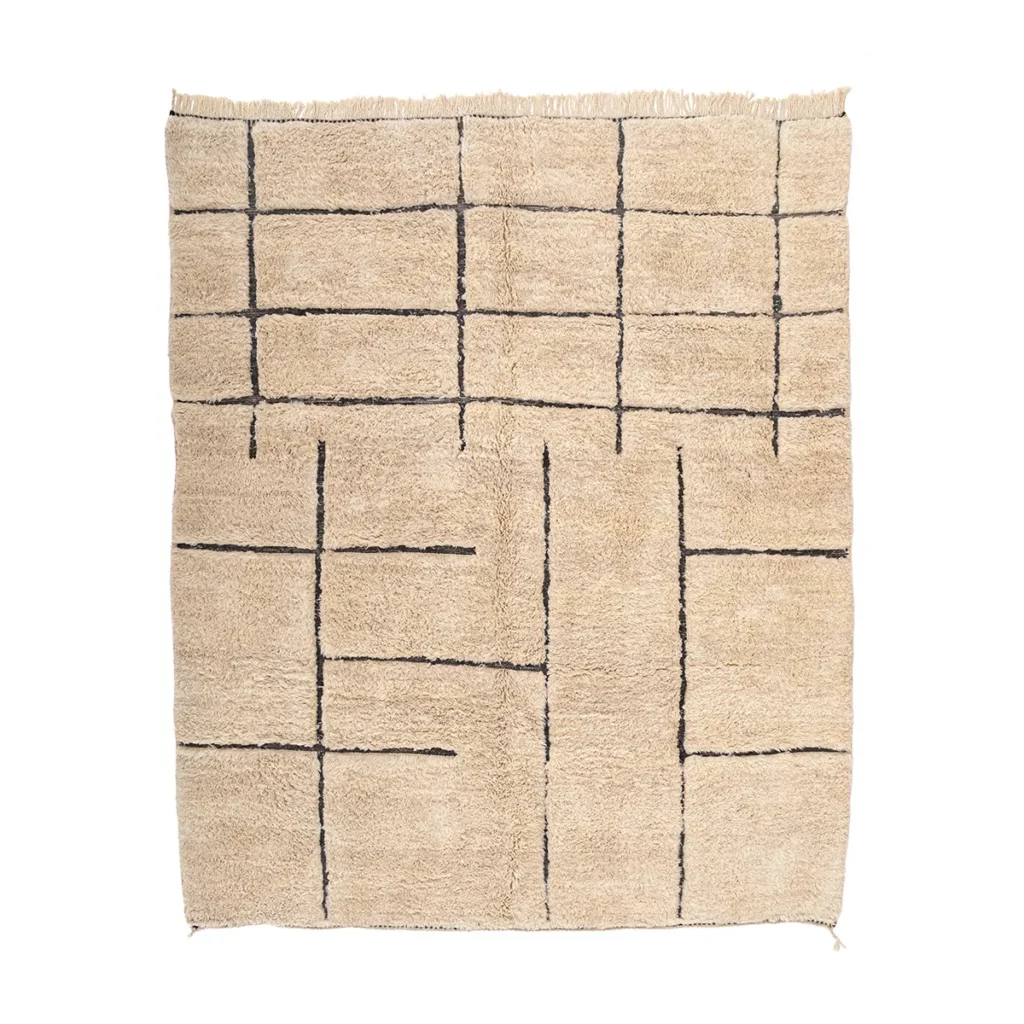 A luxurious Moroccan rug featuring a grid and line pattern in dark brown on a beige backdrop. This hand-knotted piece offers a soft texture and a simple, geometric design with elegant fringes along the top edge.