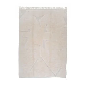 This luxurious, cream-colored rug features abstract, subtle geometric patterns and fringed edges. As a piece of handmade home decor, its perfect for adding elegance to any space.