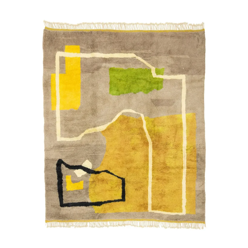 This artisanal rug boasts a striking geometric design in yellow, black, white, and green shapes set against a beige background. Hand-knotted with care, its fringed edges add a touch of elegance to your space.