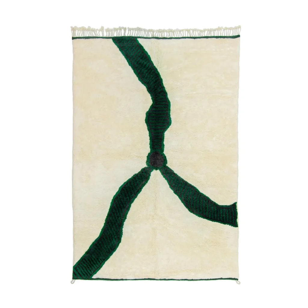 This luxurious rectangular beige rug showcases dark green abstract lines and a central black circle, elegantly crafted with fringe on the top side. Expertly hand-knotted, it exudes a sophisticated charm thats perfect for any refined space.