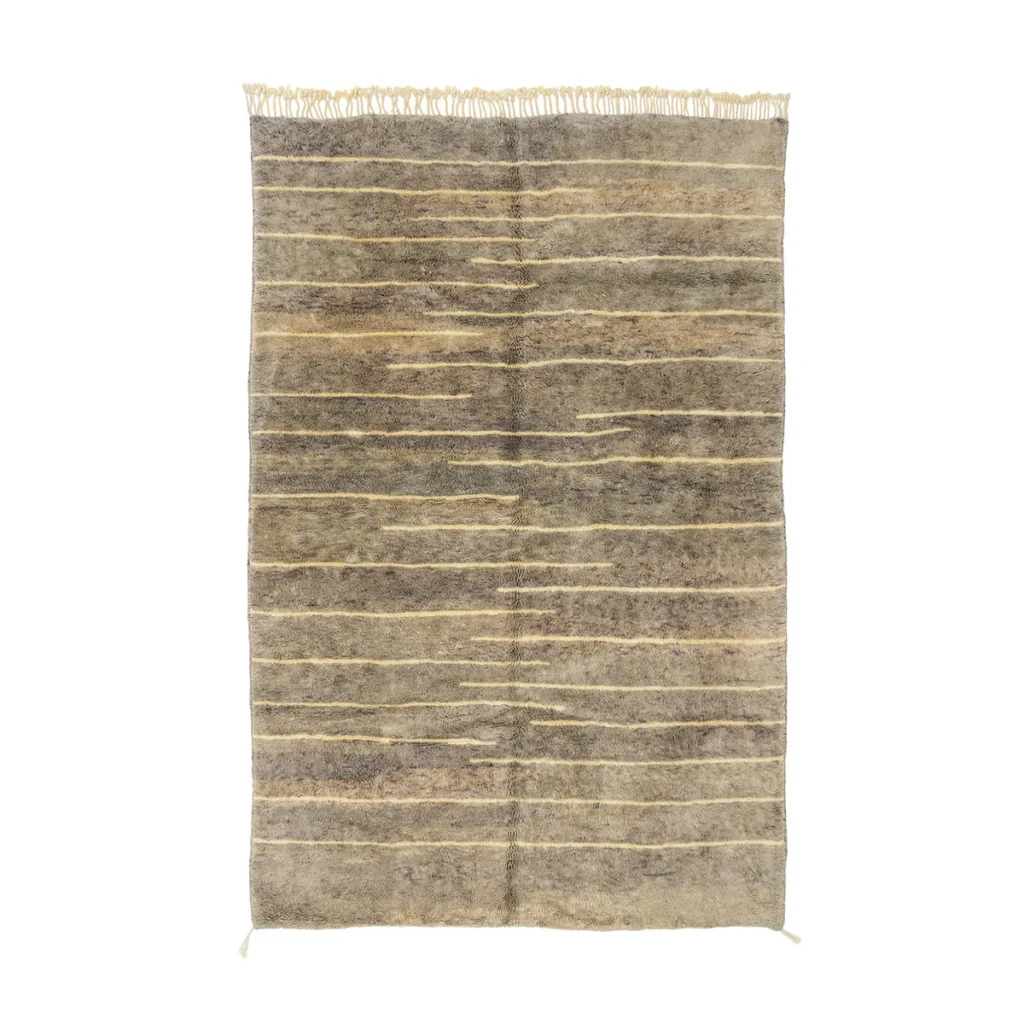This hand-knotted, artisanal rug features a rectangular design with a beige and brown striped pattern and fringed edges on two sides, adding an elegant touch to any room.
