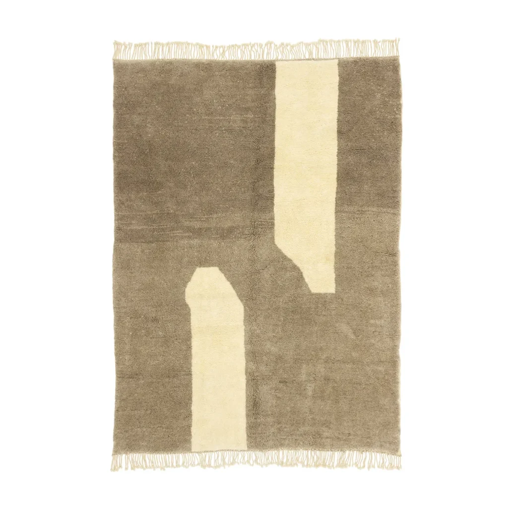 Discover an authentic Moroccan rug in beige and brown featuring abstract geometric patterns and fringed edges. This artisanal piece, hand-knotted to perfection, adds a touch of elegance to any room.