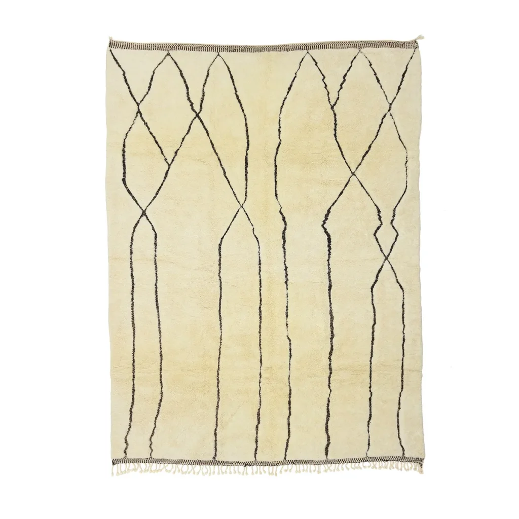 Handmade home decor rug with a minimalist design, featuring irregular black wavy lines and fringed edges at the top and bottom. This beige masterpiece adds a touch of elegance to any space, enhancing your luxury rugs collection with its unique charm.