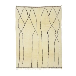 Handmade home decor rug with a minimalist design, featuring irregular black wavy lines and fringed edges at the top and bottom. This beige masterpiece adds a touch of elegance to any space, enhancing your luxury rugs collection with its unique charm.