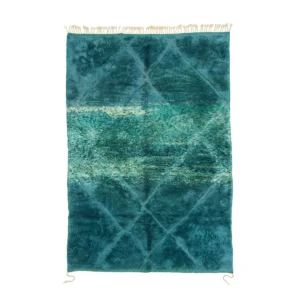 Experience the elegance of a hand-knotted Moroccan rug, featuring a teal and green textured design with a captivating diamond pattern and fringed edges.