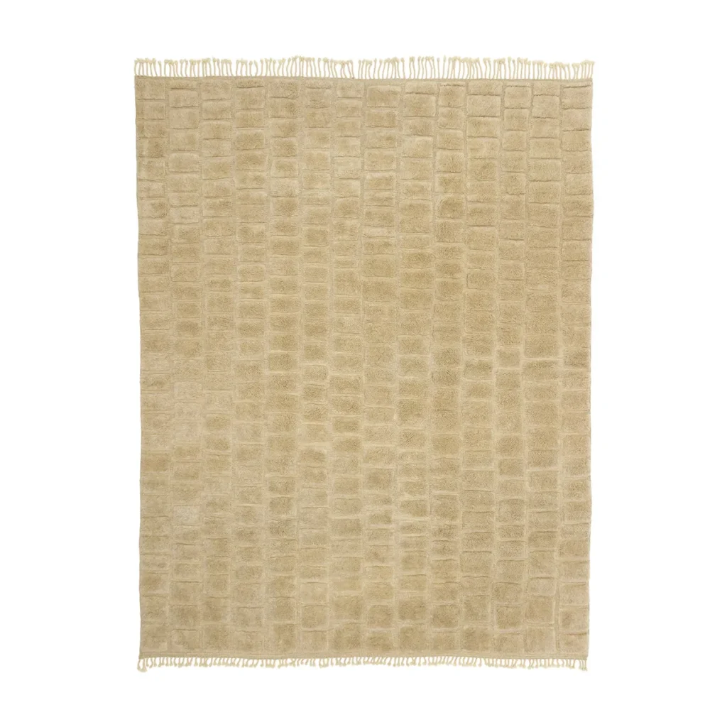 A luxurious, hand-knotted Moroccan rug in beige features a chic grid pattern and elegant fringe on the shorter sides.