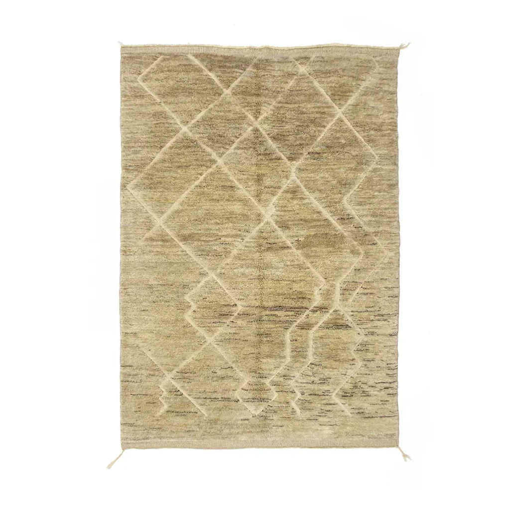 This hand-knotted beige rug features a subtle geometric diamond pattern on a white background, showcasing the craftsmanship of authentic Moroccan rugs.