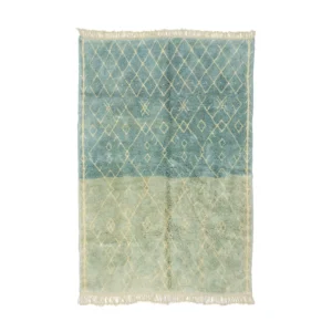 Discover a luxurious hand-knotted rectangular rug, artfully designed with blue and green hues. Its striking diamond pattern and fringed edges add an elegant touch to any space.