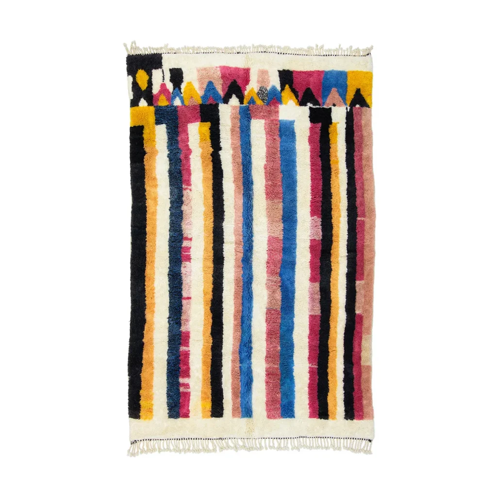 This hand-knotted rug boasts vertical stripes in yellow, black, blue, red, and pink, with a decorative pattern enhancing the top edge. Perfect for adding a touch of luxury to any room.