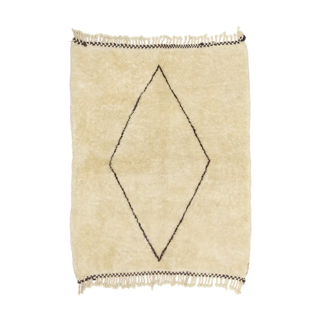 This hand-knotted beige rug features a distinctive brown diamond pattern and elegantly fringed edges, adding an artisanal touch to your space.